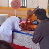 พิธีอัญเชิญผ้าไตร เครื่องสังฆทานพระราชทาน